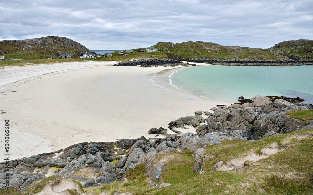 Panoramic view of the white sandy  beach of Achmelvich Bay, a settlement situated in Lairg in the Highland region of Scotland.