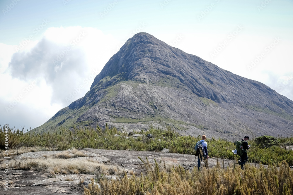 Fototapeta premium Mountaineer climbing brazil's highest peaks in the mountains with extensive hiking and backpacking.