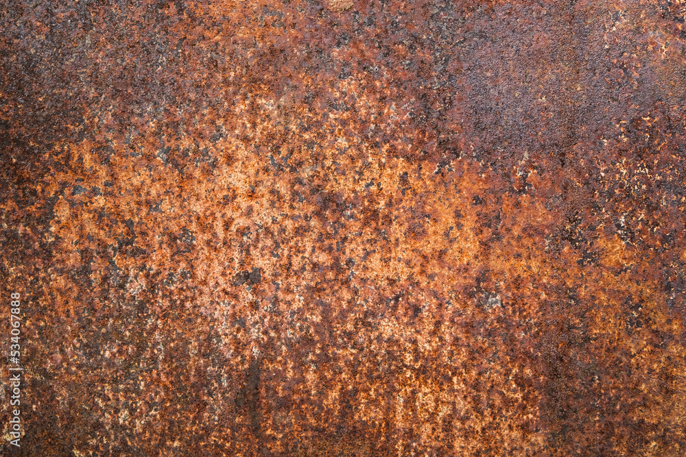 Dark light red rusty metal plate. Grunge texture. Rusty metal background. Rusty orange texture. Rust. Dark light red rusty metal plate. Grunge texture. Rusty metal background. Rusty orange texture. Rust.