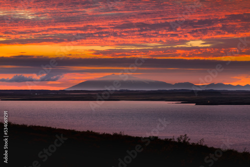 Colorful red Sunset over Sn  fellsj  kull and the Arctic Sea  in West Iceland