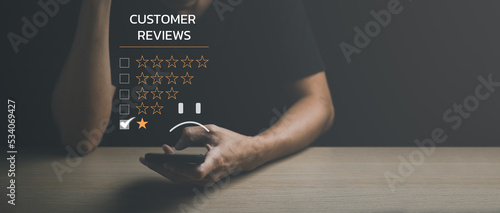 Unhappy Client with Sadness Emotion Face on a smartphone screen, Customer Experience dissatisfied, bad feedback review. lowest rating, 1 star, bad quality, client angry feeling, negative assessment,