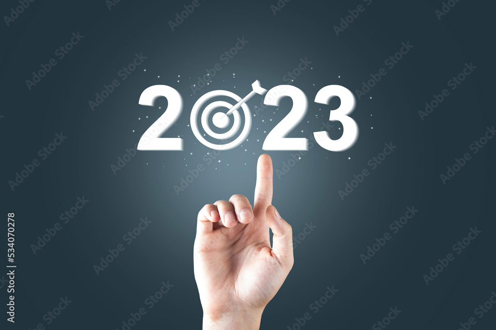 2023 and target icon on virtual screen. 2023 and target icon on virtual screen.