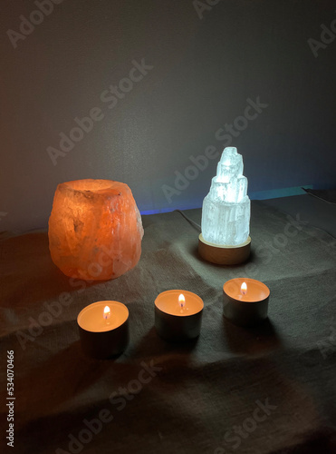 Background ritual healing, stones, candles. The practice of magic spells and cleansing. Witchcraft photo