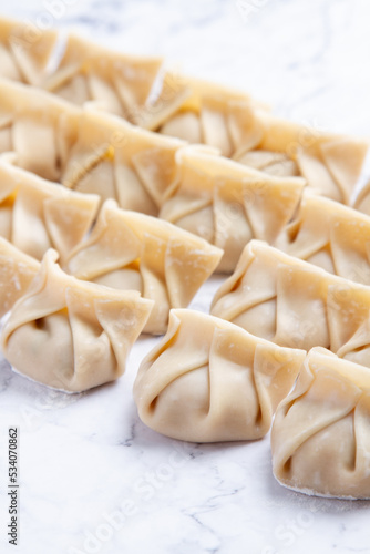 making dumplings raw