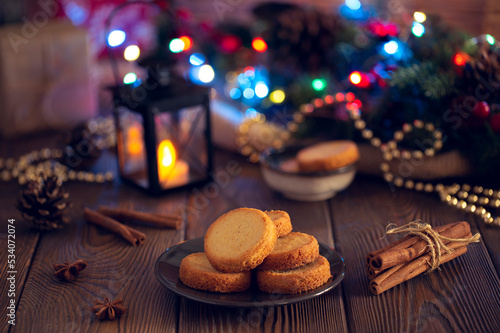 Christmas cookies with festive decoration in an evening cozy setting.