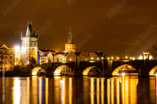 Charles Bridge in Old Town, Prague, Czech Republic at night. Lights.