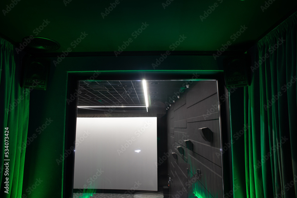 Fototapeta premium The interior of a private cinema booth in a public cinema.