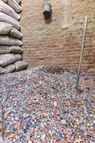 Plastic scrap for being bagged for sale in Manshiyat Naser, Garbage City, Cairo. photo