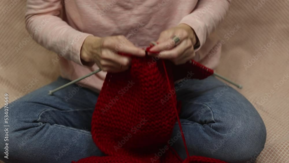 woman hands with knitting needles woman hands with knitting needles
