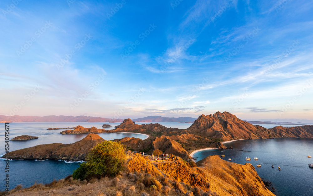 Famous view on Padar Island of Komodos, Indonesia. Sunrise welcomes the selfie crowd.
