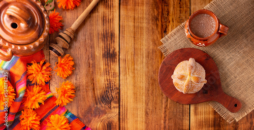 Pan de Muerto. Typical Mexican sweet bread that is consumed in the season of the day of the dead. It is a main element in the altars and offerings in the festivity of the day of the dead. photo