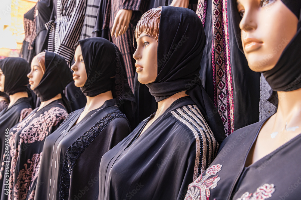 Mannequins in abayas at a clothing store in Luxor.