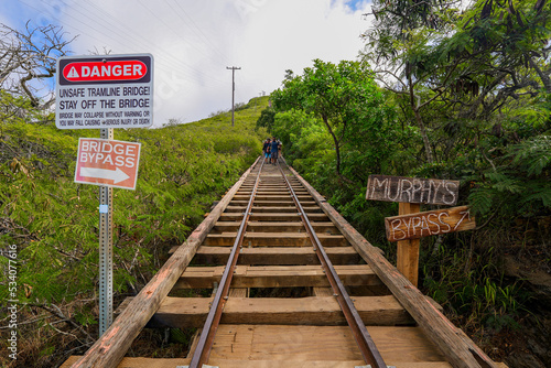 Bypass sign along the rail track of the Koko Crater Railway Trail in the suburbs of Honolulu on O'ahu island, Hawaii photo