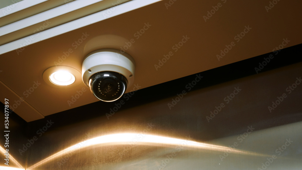 Security CCTV camera or surveillance system inside the elevator  ,Closed-circuit television,Modern CCTV camera on a wall Photos | Adobe Stock