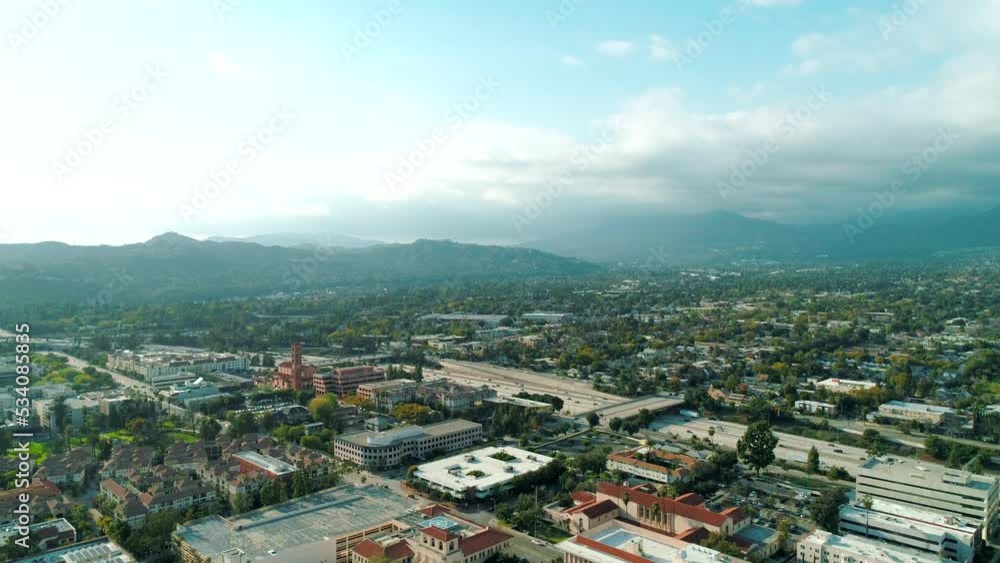 Scenic drone aerial shot of Los Angeles rolling hills of Southern California surrounded by homes and mountains. Daylight, summer. USA. High quality 4k footage Scenic drone aerial shot of Los Angeles rolling hills of Southern California surrounded by homes and mountains. Daylight, summer. USA. High quality 4k footage