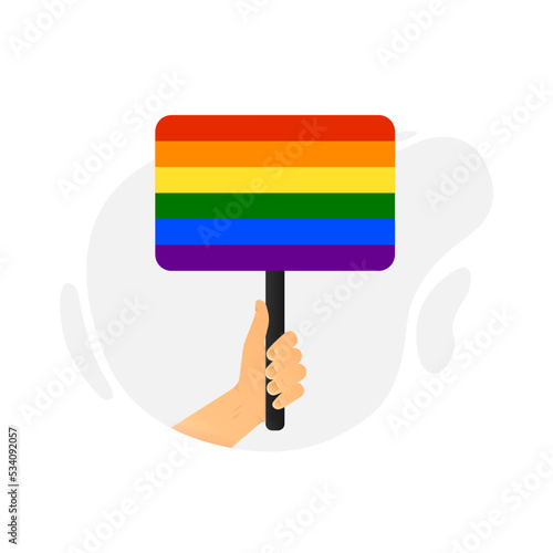 A hand holds a flag in support of the lgbt community. Vector illustration.