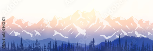 Sunrise in the mountains, ridge in the morning haze, panoramic view