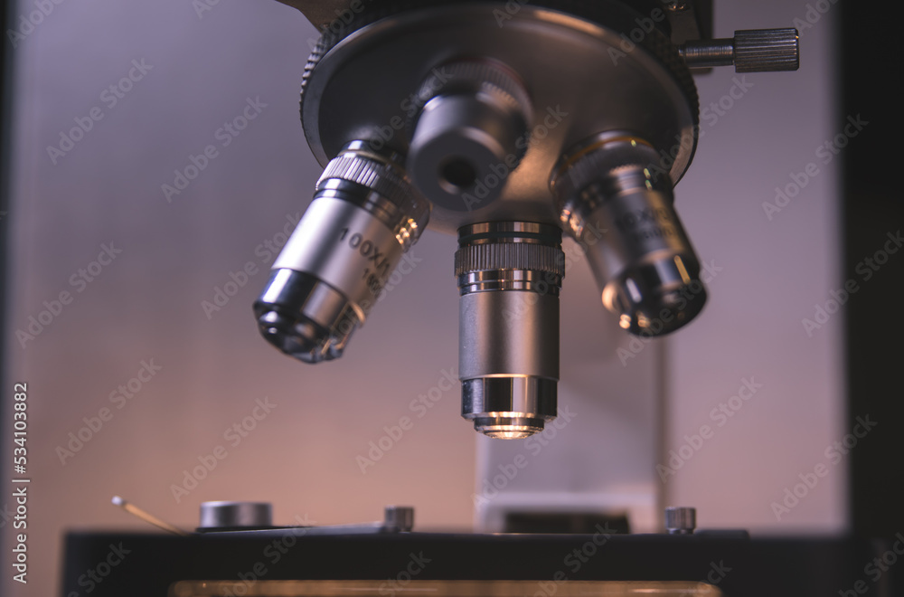 Close-up view of scientific microscopic data analysis in laboratory. Scientists research and develop medical drugs. Close-up view of scientific microscopic data analysis in laboratory. Scientists research and develop medical drugs.