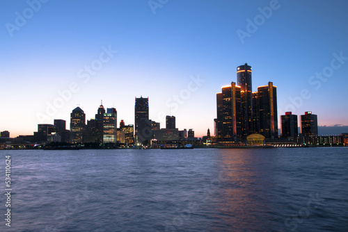 View of the skyline of Downtown Detroit, Michigan from across the Detroit river at the Windsor, Ontario riverfront at night #534110624