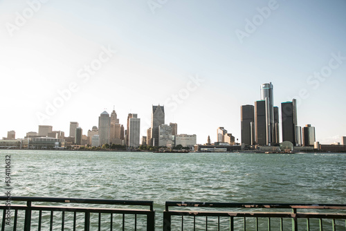 View of the skyline of Downtown Detroit, Michigan from across the Detroit river at the Windsor, Ontario riverfront on a clear day photo