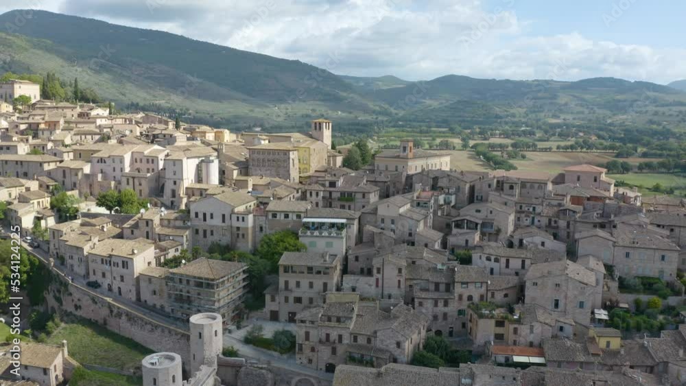 Drone Reveals Walled Town of Spello, Italy. Typical Italian Landscape Background Drone Reveals Walled Town of Spello, Italy. Typical Italian Landscape Background