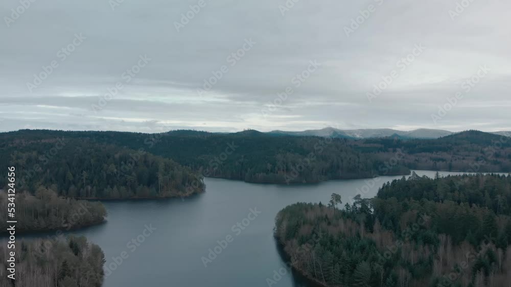 Dolly forward drone shot above Pierre-Percée lake in Meurthe-et-Moselle, France Dolly forward drone shot above Pierre-Percée lake in Meurthe-et-Moselle, France