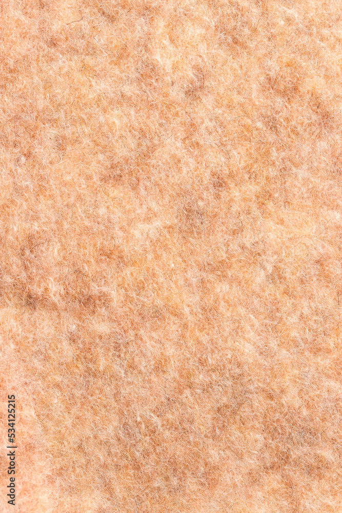Fototapeta premium Beige wool texture fabric background. Close up