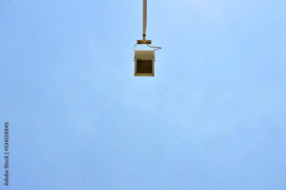 Street light lamp post led with panel system on the road with blue sky.