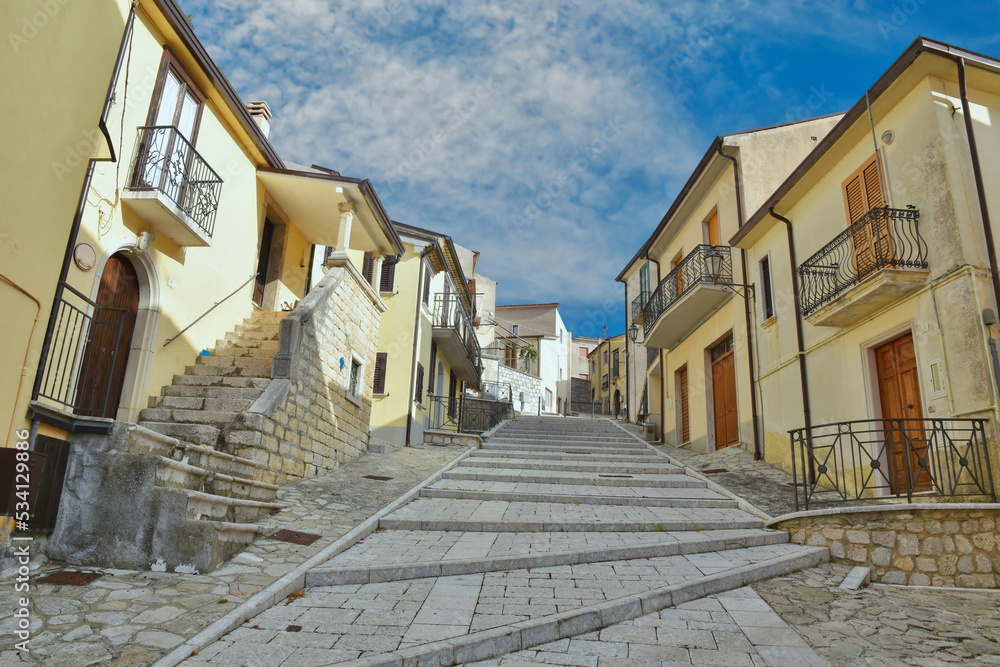 A small street between the houses of Frigento, a rural village in the province of Avellino in Italy.	