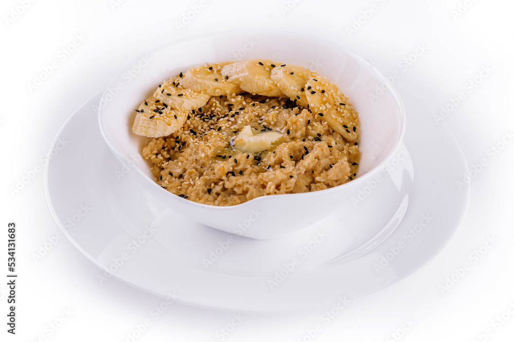 Bowl of oatmeal porridge with banana Bowl of oatmeal porridge with banana