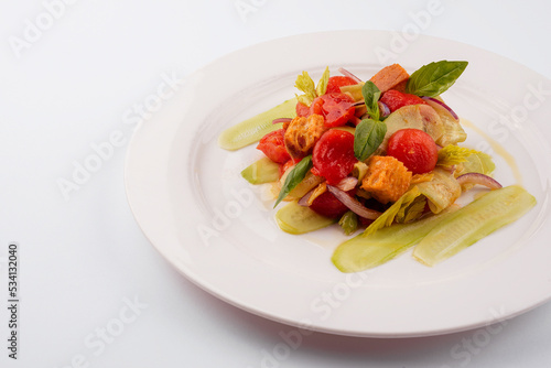 warm salad of stewed cherry tomatoes  cucumbers and croutons