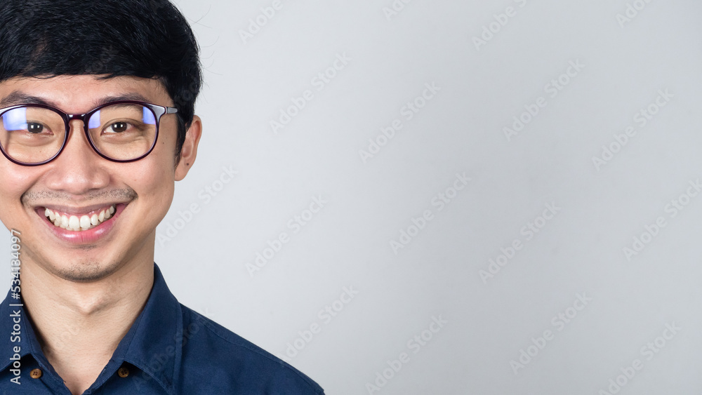 Face of positive businessman gentle smile studio shot isolated Face of positive businessman gentle smile studio shot isolated