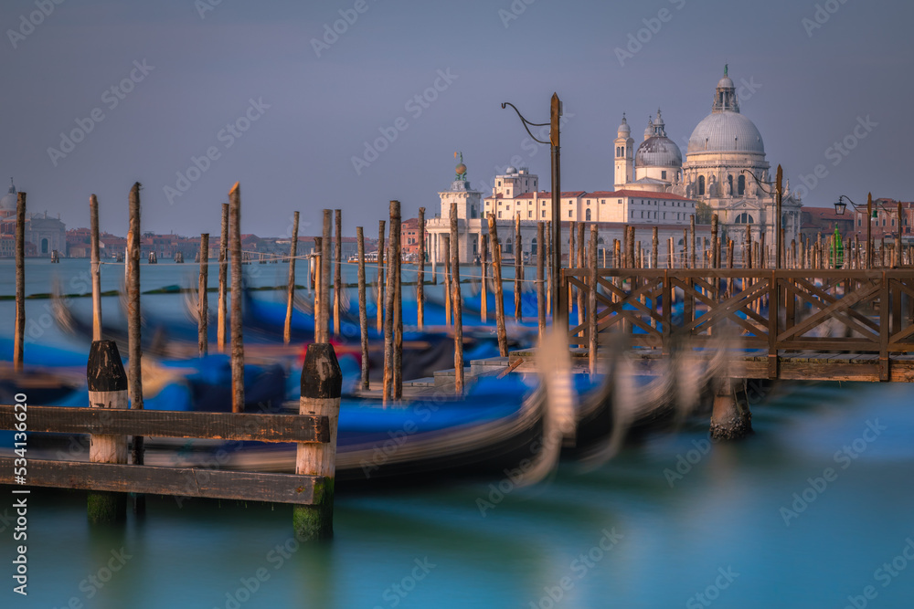 Grand Canal at peaceful dramatic dawn and gondolas, Venice, Italy