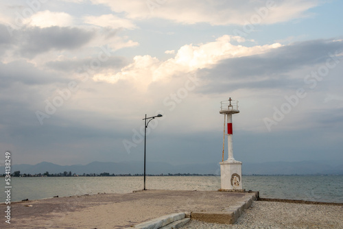 Lighthouse on the beach in Myli Greece