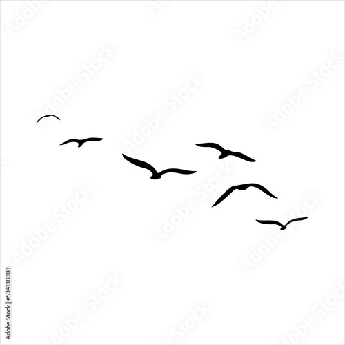 A Hand Drawn Flock of Flying Birds and Sun. Monochrome Bird Silhouettes. © milaart17