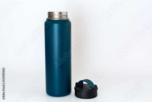 Blue thermos, isolated on white background.