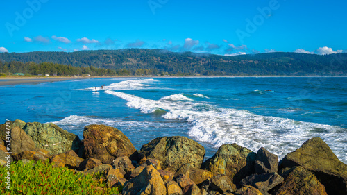 Seascape with waves rolling in on Crescent Beach near Del Norte Coast Redwood State Park in Crescent City, California photo