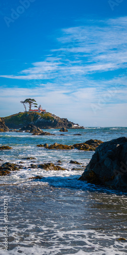 Wallpaper Mural Seascape of rocky beach in the bay at Battery Point Lighthouse in Crescent City, California Torontodigital.ca