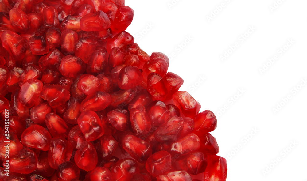 Pomegranate seeds on white background with copy space. Pomegranate seeds on white background with copy space.