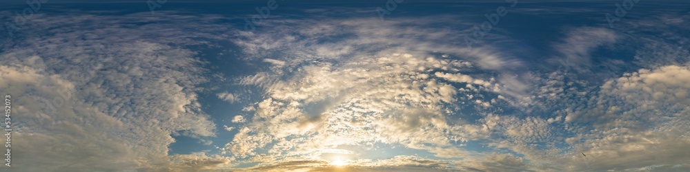 Obraz premium Dark blue sunset sky panorama with golden Cumulus clouds. Seamless hdr 360 panorama in spherical equirectangular format. Full zenith for 3D visualization, sky replacement for aerial drone panoramas.