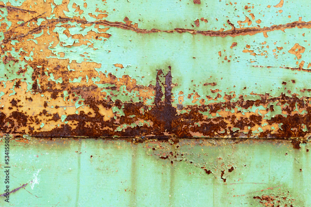 Texture of the old green paint is a rusty surface. Grunge background with space for design Texture of the old green paint is a rusty surface. Grunge background with space for design