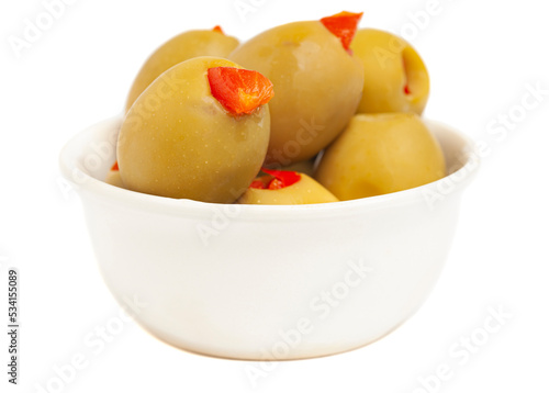 Green olives stuffed with sweet peppers isolated on a white background