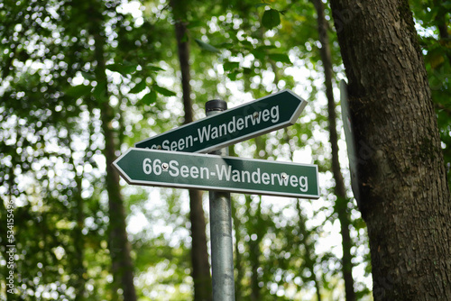 A guide post "66 lake trail" (66 Seen Wanderweg) along a hiking trail in Hennickendorf, federal state of Brandenburg - Germany