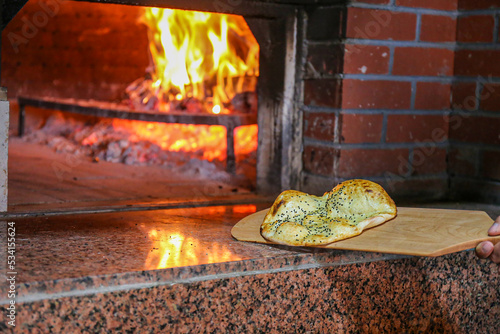 Turkish style pita and stone oven photo