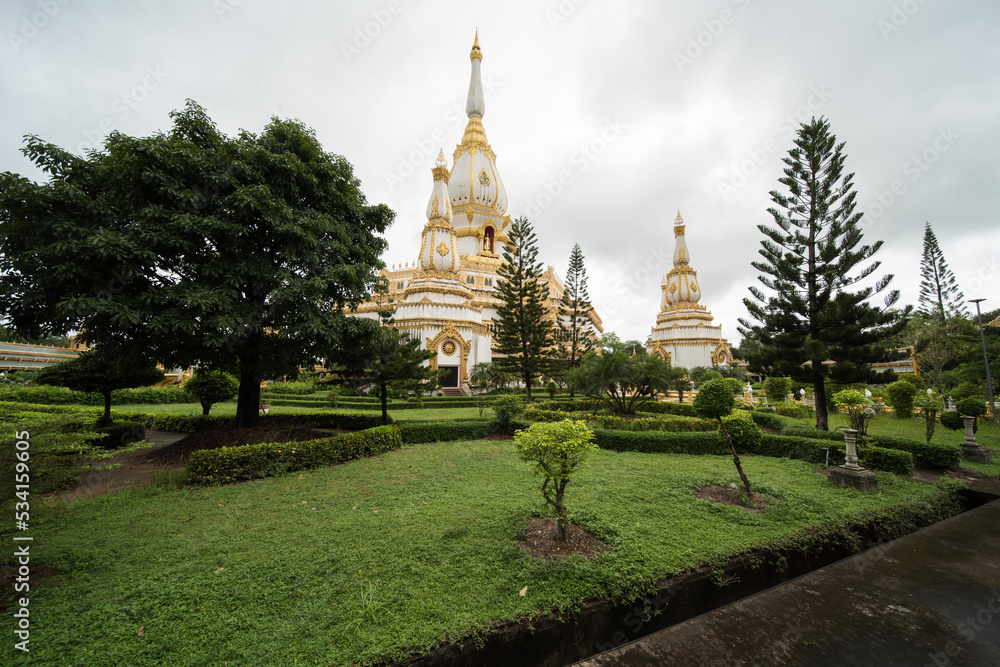 Fototapeta premium Phra Maha Chedi Chai Mongkol, one of the largest chedis (pagoda) in Thailand, in Amphoe Nong Phok, Roi Et Province in northeast Thailand.