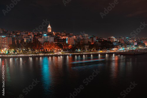 Galata tower and Cityscape view at night of Istanbul city and Bosphorus strait 