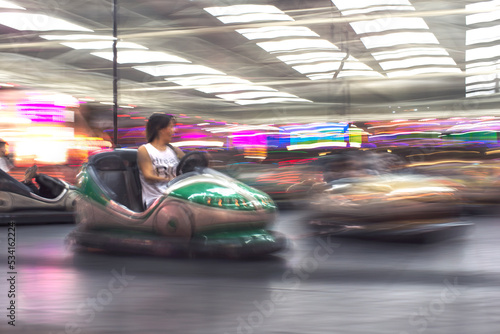 Abstract photo of bumper cars at amusement park of izmir fun fair. © ardasavasciogullari