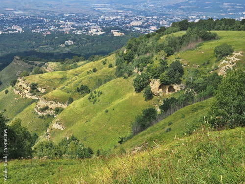 Panoramic views from Bolshoye Sedlo mountain to the Kislovodsk National Park and the city of Kislovodsk  North Caucasus  Russia.