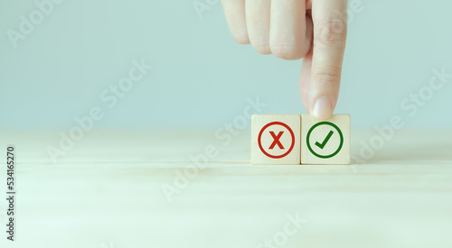 Regulatory compliance, project feasibility concept. Tick and cross signs. Checkmark and cross icons. Do and don't or like and unlike with positive and negative sign, approve and disapprove symbols.