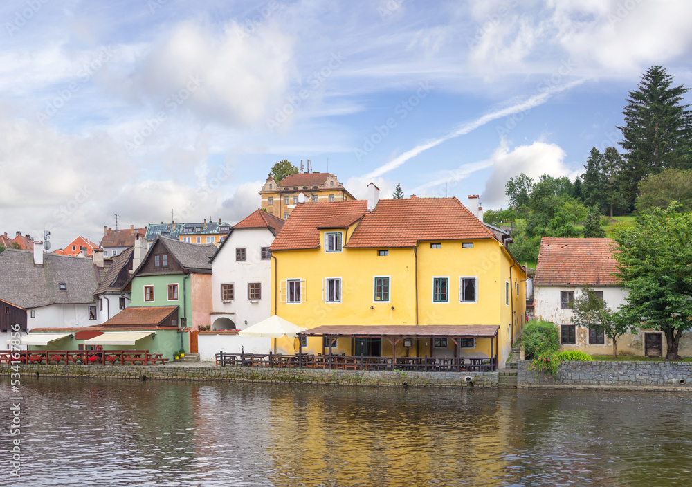 Fototapeta premium Beautiful old buildings on the embankment of the Vltava river. Cesky Krumlov, Czech Republic